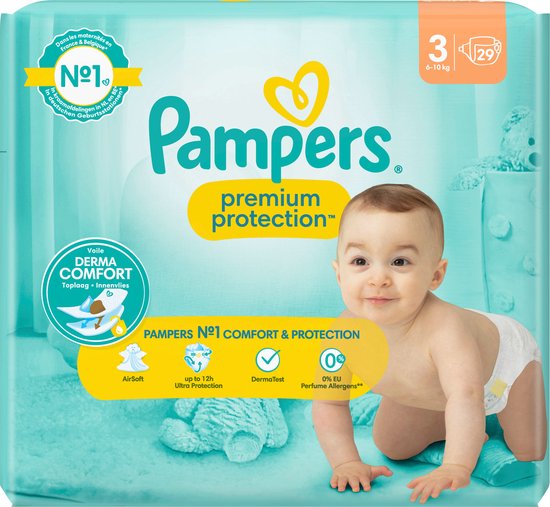 zielone male kulki w kupce niemowlaka pampers